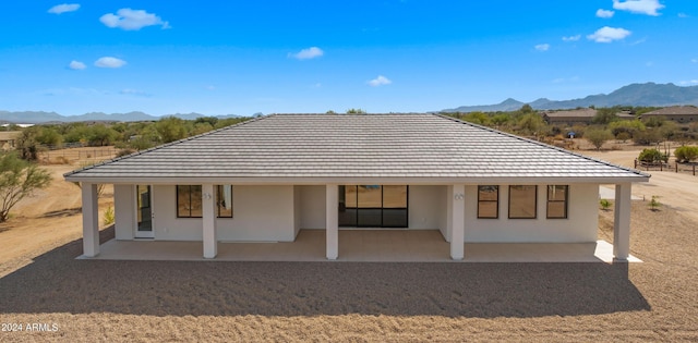 29811 N 154th St, Scottsdale, AZ 85262 - back of house featuring a patio, stucco siding, a tiled roof, and a mountain view