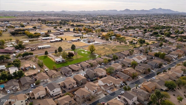 birds eye view of property featuring a mountain view