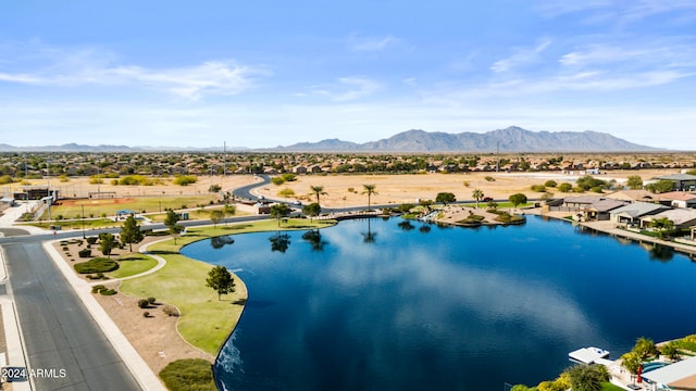 bird's eye view featuring a water and mountain view