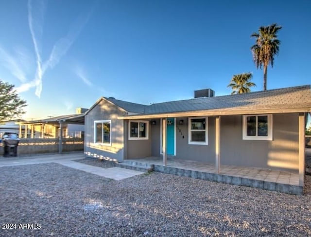 ranch-style house featuring a patio area