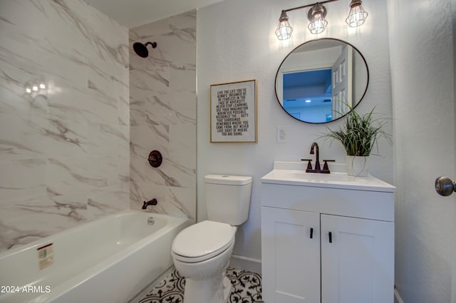 full bathroom featuring vanity, tiled shower / bath combo, and toilet