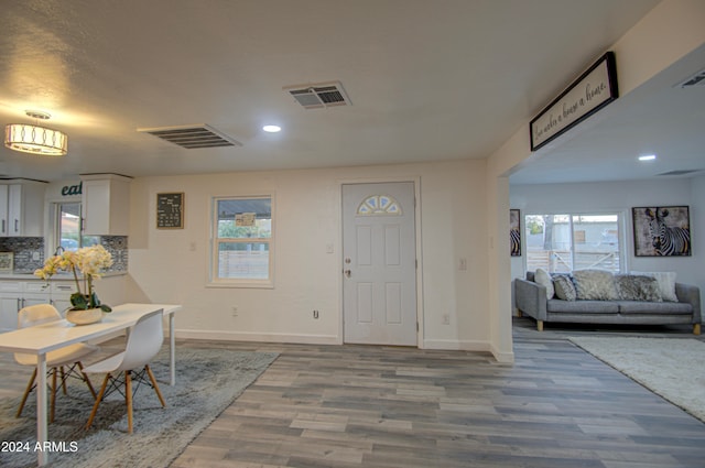 entrance foyer with light hardwood / wood-style floors