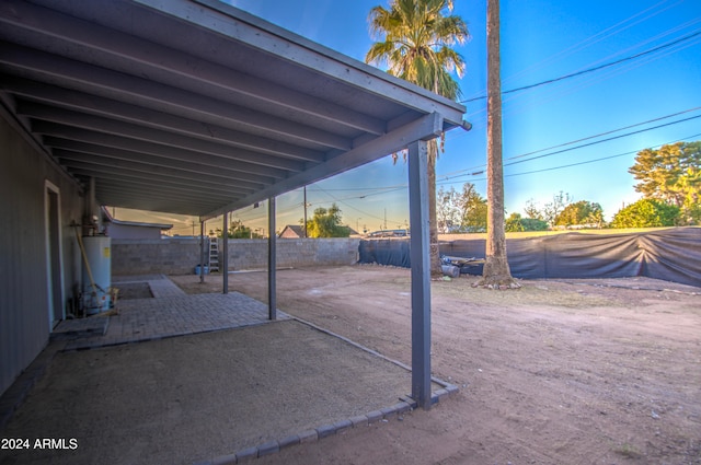 view of patio / terrace featuring water heater