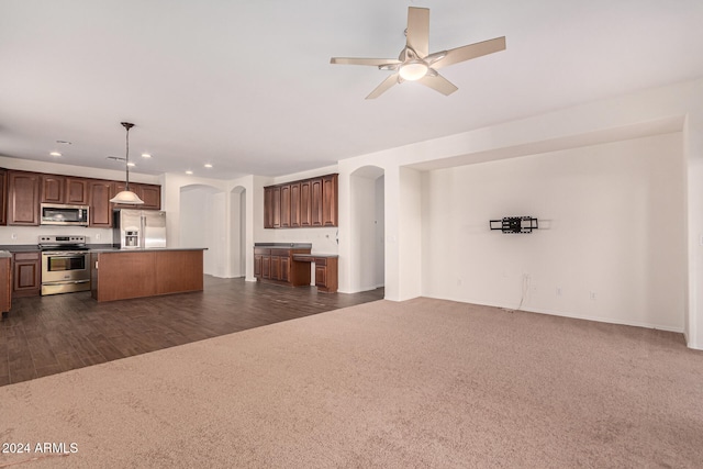 interior space featuring ceiling fan and dark wood-type flooring