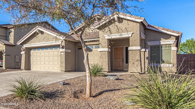 view of front of property featuring a garage