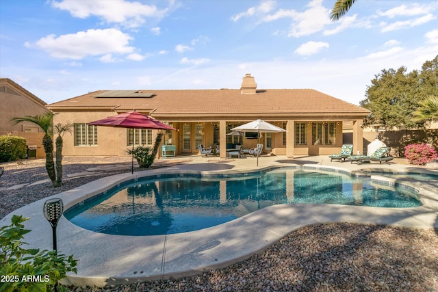 view of pool featuring a patio area