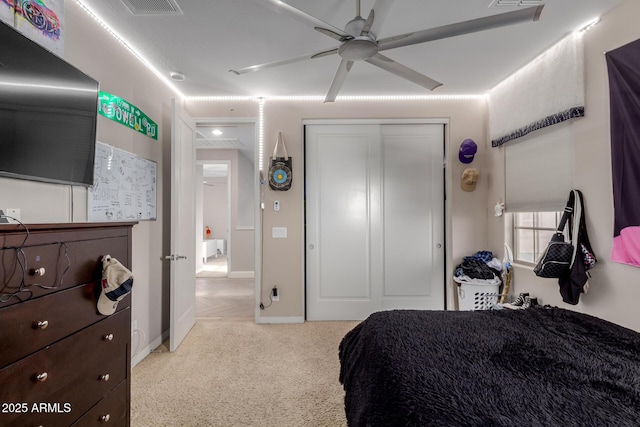 16178 W Granada Rd, Goodyear, AZ 85395 - bedroom with a closet, light carpet, and a ceiling fan