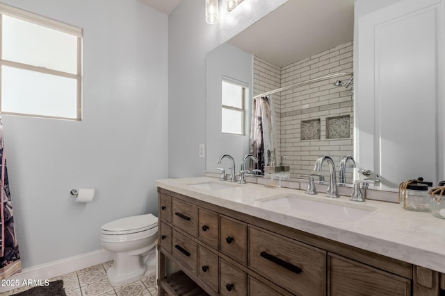 16178 W Granada Rd, Goodyear, AZ 85395 - full bath featuring double vanity, tile patterned flooring, and tiled shower