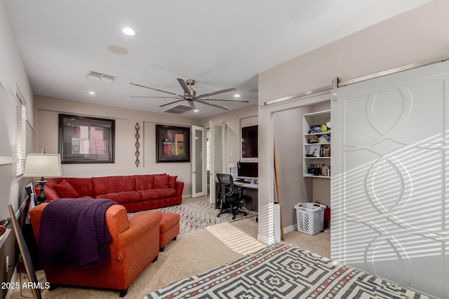 16178 W Granada Rd, Goodyear, AZ 85395 - carpeted living room featuring an office area, a ceiling fan, and recessed lighting