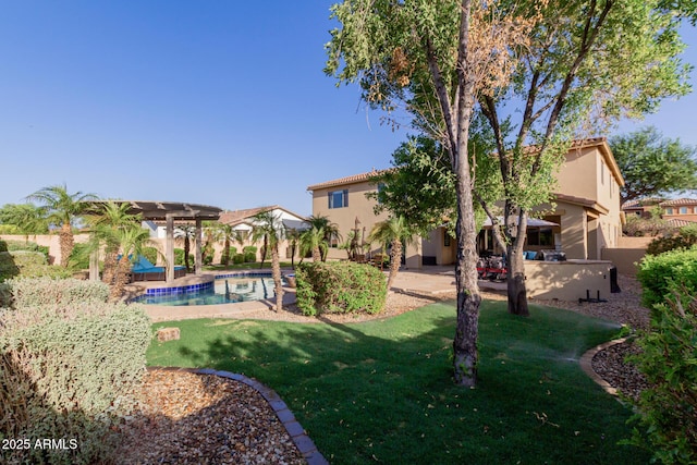 16178 W Granada Rd, Goodyear, AZ 85395 - view of grassy yard featuring an outdoor pool, a pergola, and a patio
