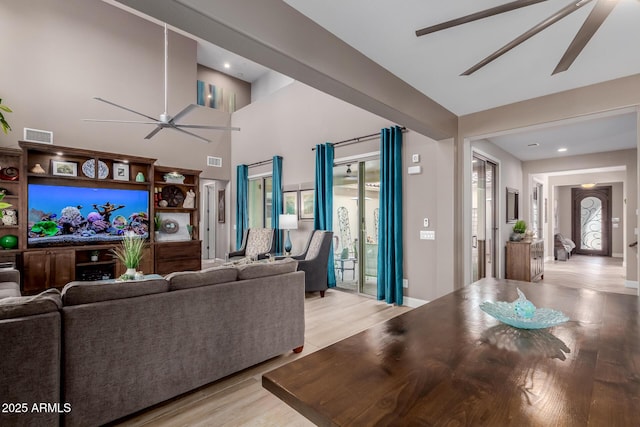 16178 W Granada Rd, Goodyear, AZ 85395 - living area featuring a ceiling fan and light wood-style flooring