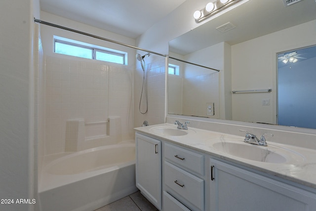 bathroom featuring vanity, ceiling fan, tiled shower / bath, and tile patterned floors