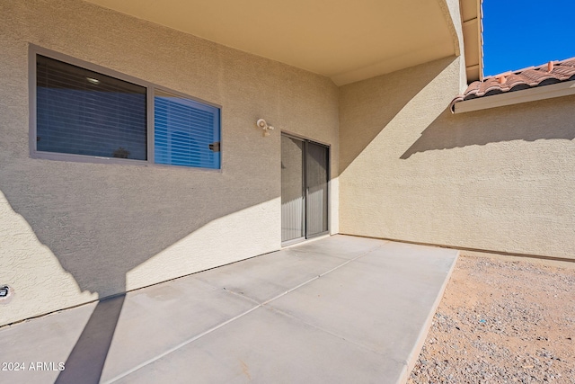 doorway to property featuring a patio