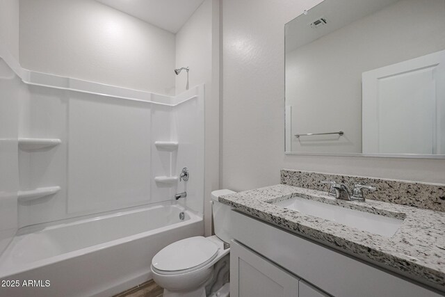 39965 W Sparks Ln, Maricopa, AZ 85138 - bathroom with vanity, toilet, and  shower combination
