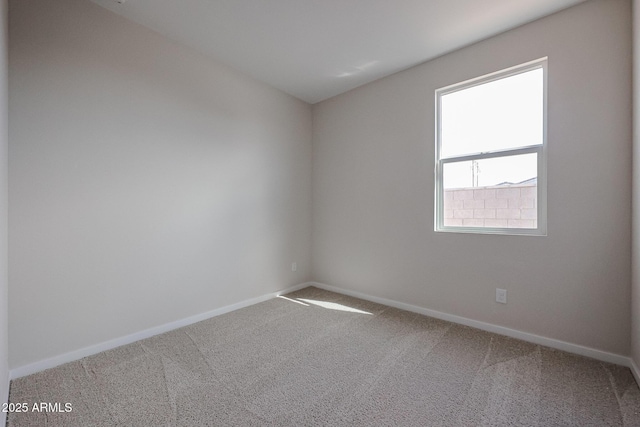 39965 W Sparks Ln, Maricopa, AZ 85138 - carpeted empty room with plenty of natural light and baseboards