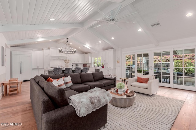 6196 E Calle Camelia, Scottsdale, AZ 85251 - living room with light wood-style floors, a chandelier, recessed lighting, and a ceiling fan