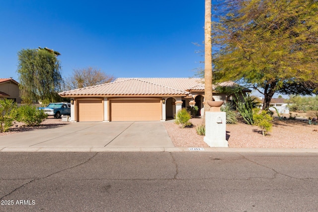 view of front of property with a garage