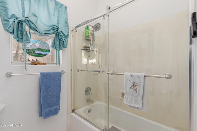 bathroom featuring enclosed tub / shower combo