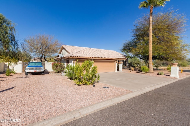 view of front of property featuring a garage