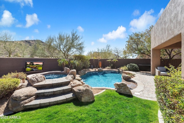 view of pool with a fenced in pool and a fenced backyard