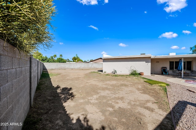 14830 N 28th Pl, Phoenix, AZ 85032 - fenced backyard featuring a patio area