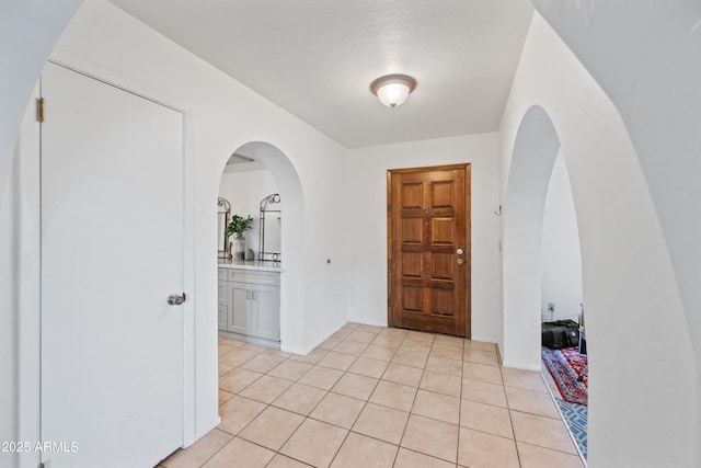 14830 N 28th Pl, Phoenix, AZ 85032 - foyer entrance with light tile patterned flooring and arched walkways