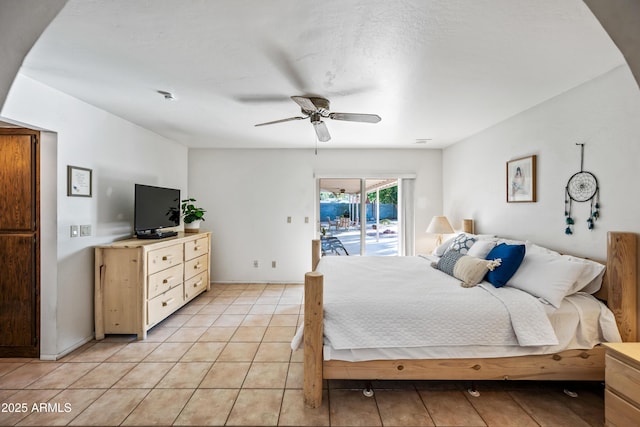 14830 N 28th Pl, Phoenix, AZ 85032 - bedroom featuring access to exterior, light tile patterned floors, and a ceiling fan