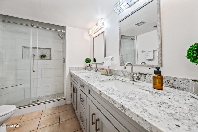 14830 N 28th Pl, Phoenix, AZ 85032 - full bath featuring double vanity, a stall shower, and tile patterned flooring