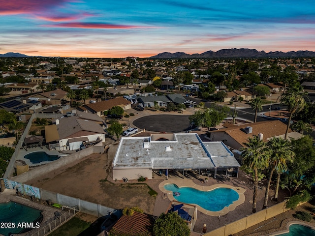 14830 N 28th Pl, Phoenix, AZ 85032 - aerial view at dusk of view of pool, a mountain view, and a residential view