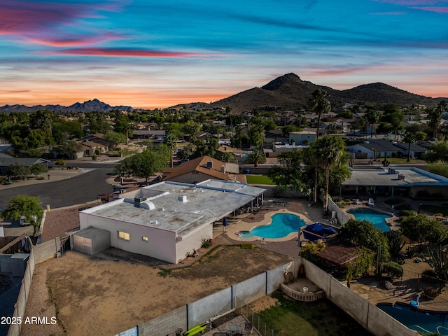 14830 N 28th Pl, Phoenix, AZ 85032 - aerial view of residential area featuring a mountain backdrop and a pool area