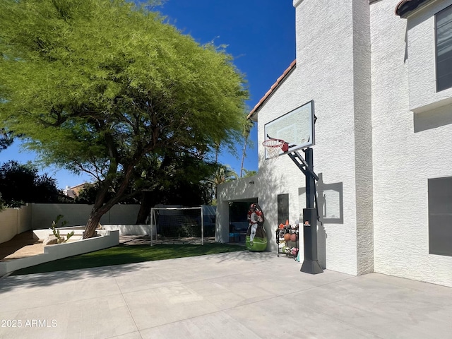 5556 E Sandra Ter, Scottsdale, AZ 85254 - view of patio / terrace with basketball hoop