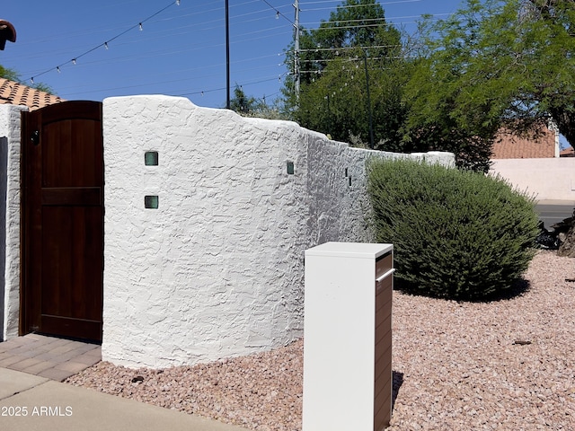 5556 E Sandra Ter, Scottsdale, AZ 85254 - exterior view of a gate and stucco siding