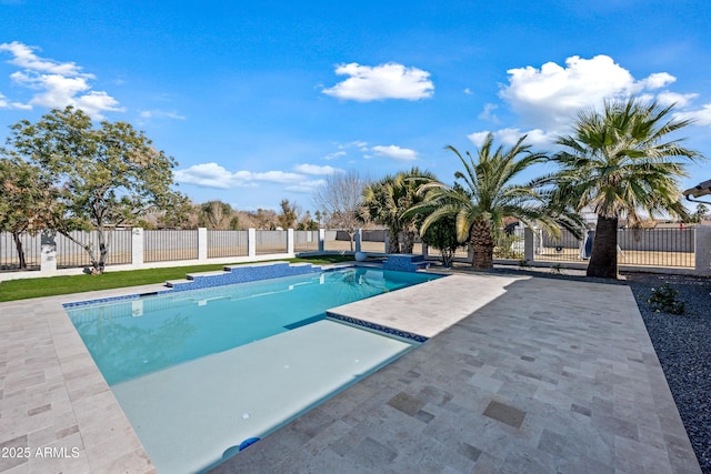 view of swimming pool featuring a patio area