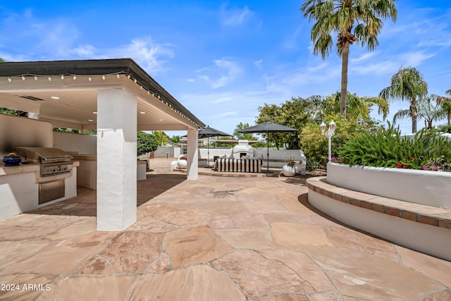 view of patio with a gazebo, grilling area, and area for grilling