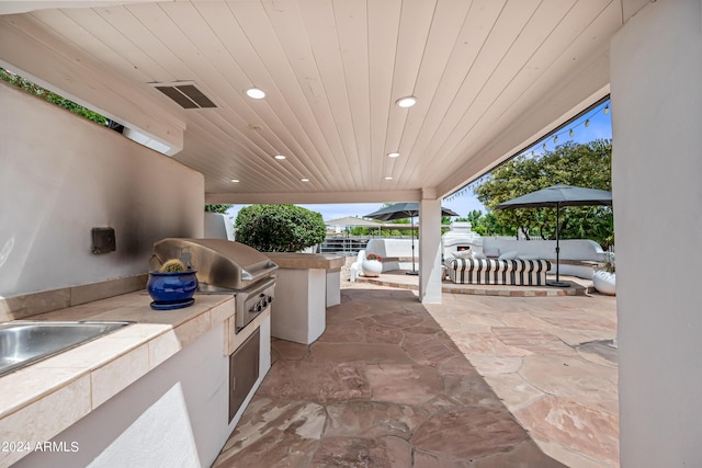 view of patio / terrace featuring area for grilling and grilling area