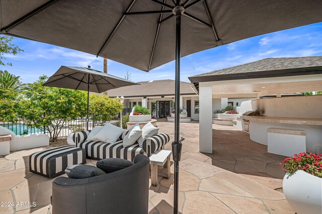 view of patio / terrace with outdoor lounge area and area for grilling