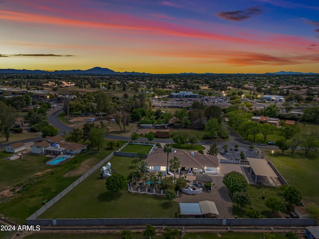 aerial view at dusk with a mountain view