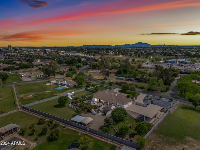 aerial view at dusk with a mountain view