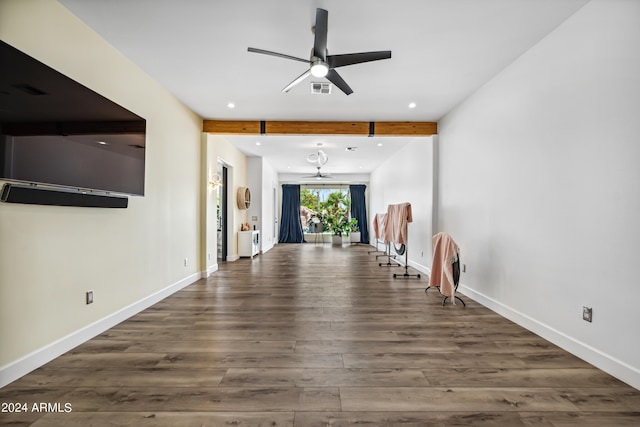 interior space featuring beam ceiling, ceiling fan, and dark hardwood / wood-style floors