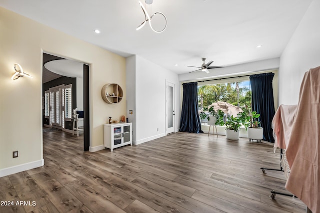 interior space with hardwood / wood-style flooring and ceiling fan