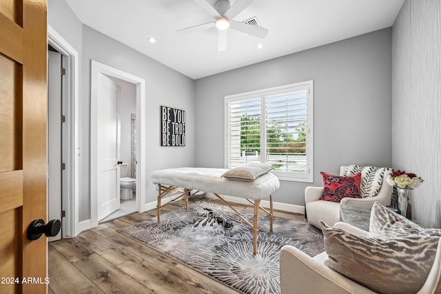 office featuring ceiling fan and light hardwood / wood-style floors