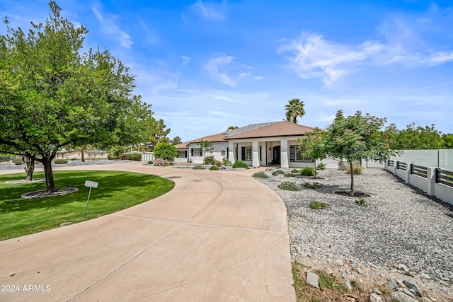 view of front of home with a front lawn