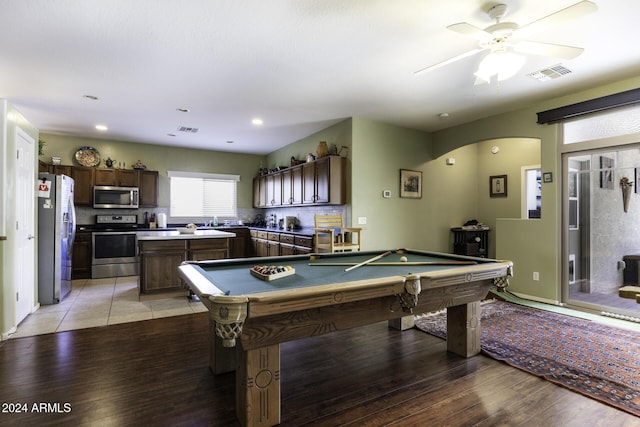 playroom featuring light hardwood / wood-style floors, ceiling fan, and pool table