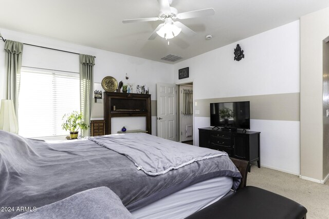 carpeted bedroom featuring ceiling fan