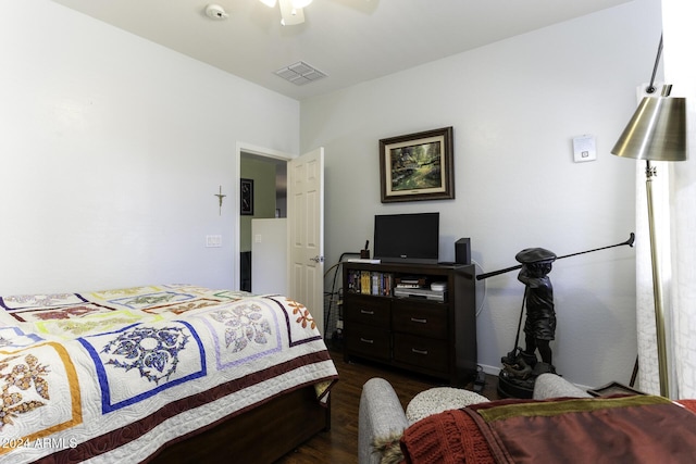 bedroom featuring ceiling fan and dark hardwood / wood-style floors