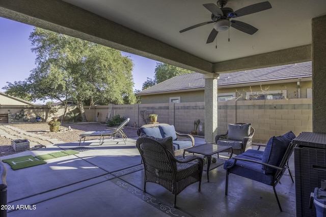 view of patio / terrace featuring an outdoor living space and ceiling fan