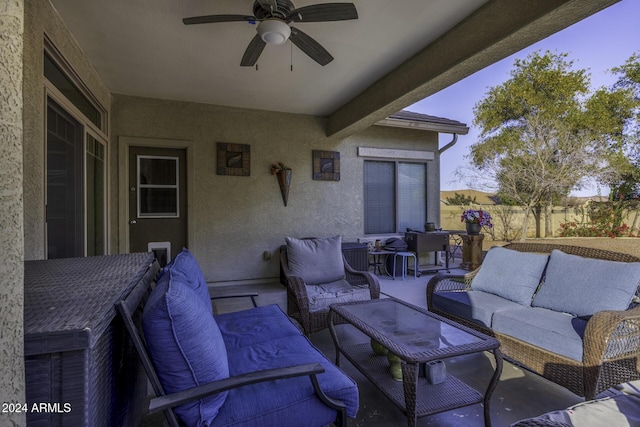 view of patio / terrace with an outdoor living space and ceiling fan