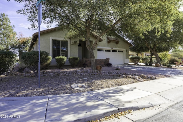 view of front of property featuring a garage