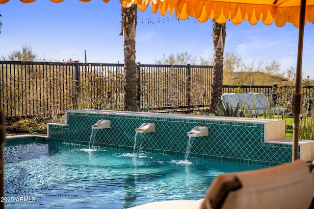 view of pool featuring pool water feature