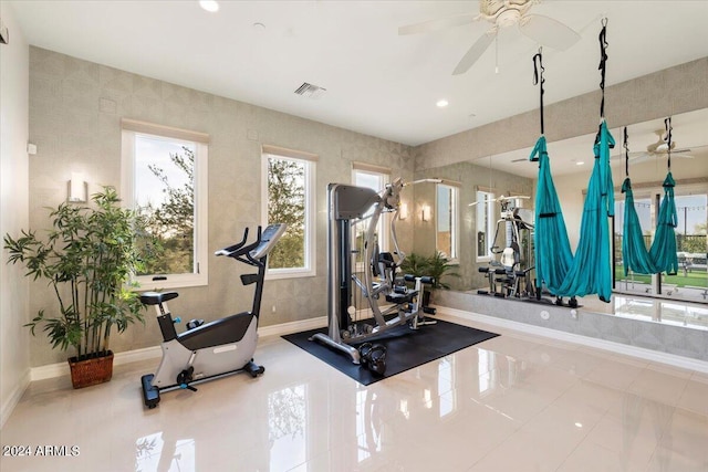 workout room with ceiling fan